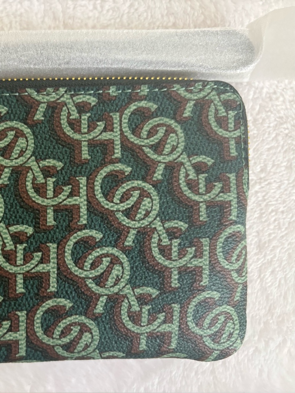 Coach monogram green corner zip wristlet